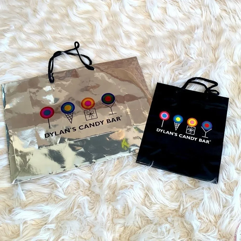 Dylan’s Candy Bar Paper Shopping Bags. One Black and One Silver Metallic.